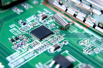 Electronic circuit board closeup. Electronic computer hardware technology macro.. Motherboard...