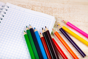 Obraz premium Items for the school on a wooden table.