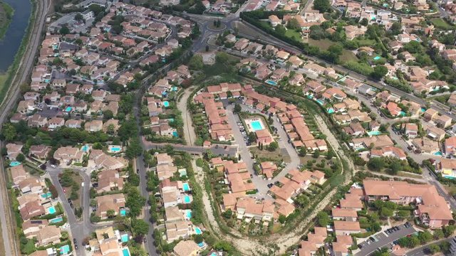 residential houses area with swimming pools Lattes Montpellier France aerial sunny day river Lez