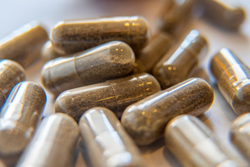 Pharmaceutical medicine pills and capsules. Pills background. medicine tablets and pills background. Health care. Macro of stomach pill