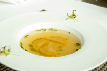  delicious clear soup on white bowl