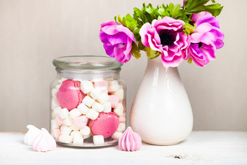 Meringue and marshmallow in a glass jar.