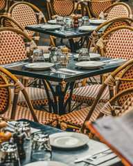 A row of chairs and tables at a outdoor cafe on Hardware Lane Bourke Street and Little Lonsdale Street, Melbourne, Australia