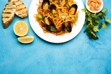 Flat-lay seafood dishes with copyspace