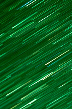background abstract dynamic green neon light and stripes moving fast