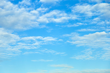Beautiful white fluffy clouds in blue sky for background picture.