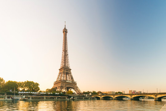 Eiffel Tower early in the morning viewed from the other side of the River Seine, Paris, France