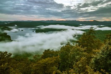 sunset over lake jcassee from jumping off rock overlook