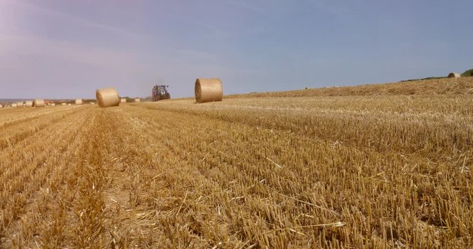tractor and its trailer to make, the straw bales