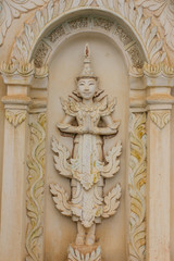 angel and traditional Thai style art, old wall chapel