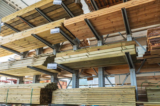 Shelves With Wooden Boards At Building Material Store