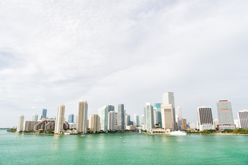 Miami has an Atlantic Ocean waterfront lined with marinas. Downtown Miami is urban city center based around Central Business District of Miami. Skyscrapers and azure ocean water. Must see attractions