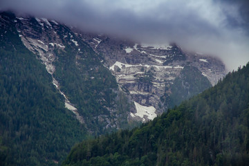 Alps, Austria Beautiful landscape with Alp. Mountains peaks covered with snow in a cloudy day