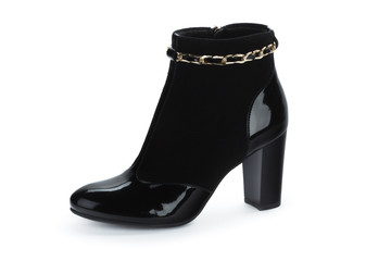 Female autumn-winter leather ankle  boots isolated on white background