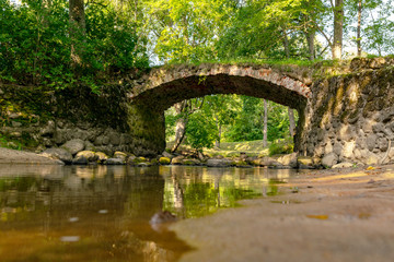 beautiful stone bridge over the river Kuya, beautiful morning light, deep shadows