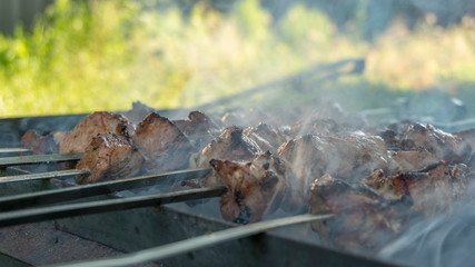 cooking meat on skewers