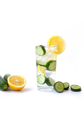 İced water with cucumber isolated on white background. Diet.