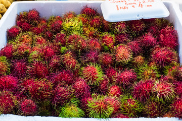Fresh Rambutans for sale at street market in Singapore