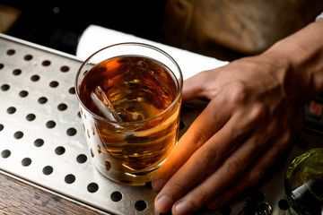 Close-up of a whiskey with ice inside