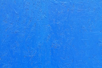 Blue painted OSB board as background, texture