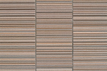 Textured facade stone wall as background, texture