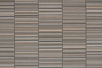 Textured facade stone wall as background, texture