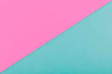 Bright pink and turquoise blue paper background with geometric lines.Two tone of colorful paper texture.Copy space.