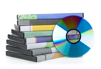DVD, CD-ROM or Blu-Ray disc with stacked boxes for movies, audio or software on white - obrazy, fototapety, plakaty