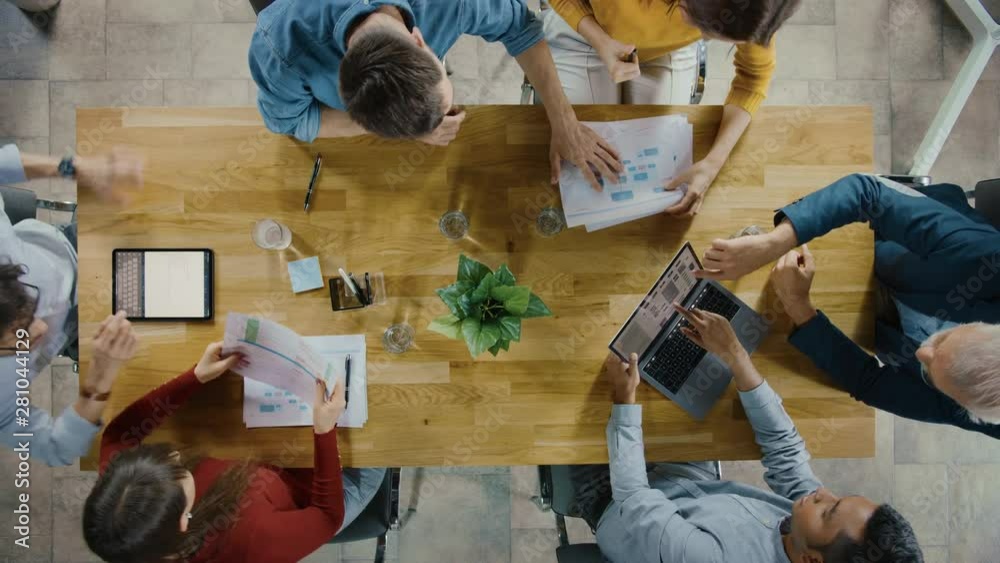 Poster startup meeting room: team of entrepreneurs sitting at the conference table have discussions, solve 