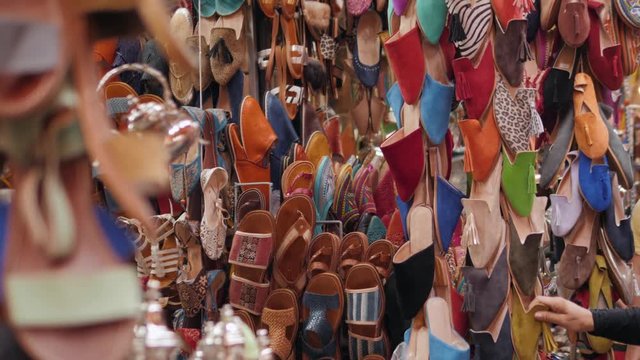 Marrakech - market stalls in Medina old city. Bags and leatherin  Marocco marketplace, craftsman product arabian