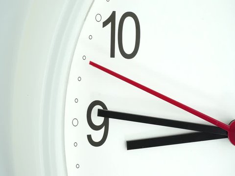 The beginning of time 08.45 am or pm, Closeup White wall clock Red second hand minute Walk slowly, Time concept.