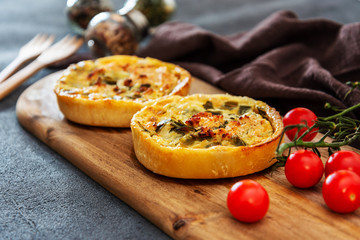 vegetable pie with cherry tomatoes, grilled peppers and courgettes with fresh eggs and fresh cream