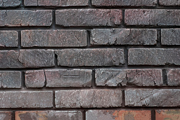 brick stone old wall texture. old worn brick wall texture background. Vintage effect. Brick wall of dark tiles.