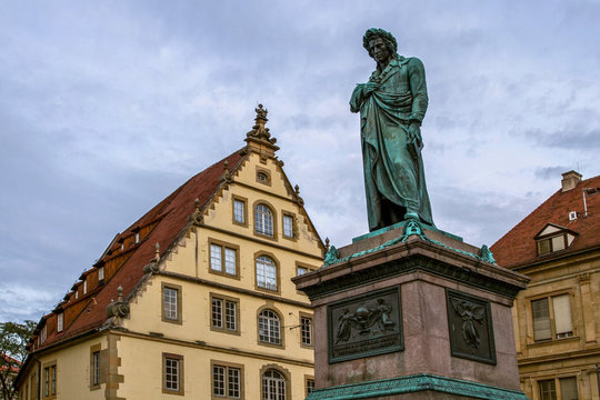 Schiller Square.  Monument to great writer  Schiller, close to historic collegiate buildings, Fruchtkasten and Prinzenbau, Stuttgart, Germany.