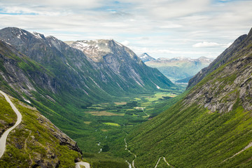 Naklejka premium Trollstigen or Trolls Path is a serpentine mountain road in Rauma Municipality in Norway