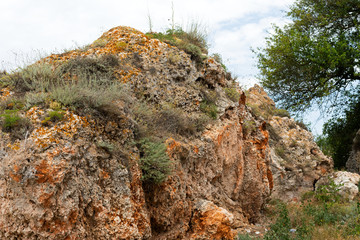 Rocky clay cliffs at the beach