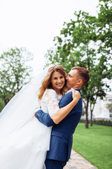 Fototapeta premium beautiful young wedding couple in nature, couple in love