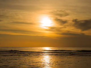 Fototapeta na wymiar sunrise over summer sea background.