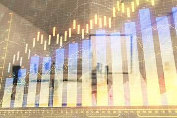 Stock market chart with trading desk bank office interior on background. Double exposure. Concept of financial analysis