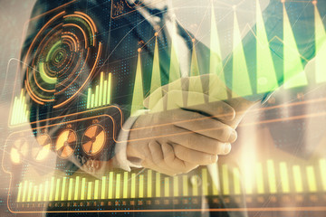 Double exposure of business theme drawing on cityscape background with handshake. Concept of...