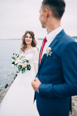 Wedding couple on the sea, lovers on the pier