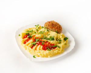 Chicken cutlet with mashed potatoes and chopped herbs on white background
