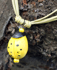 an hand made polymer clay yellow pendant