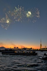 St. Petersburg, Russia, July 2019. A magnificent fireworks over the river channel and the Peter and Paul Fortress. 