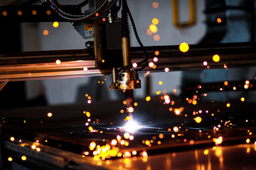 Industrial cnc plasma cutting metal plate.