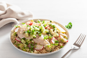 chicken breast with couscous, cucumber, avocado, spring onion, radish. healthy lunch