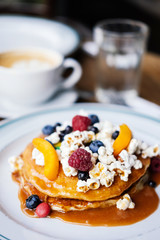 delicious breakfast with cupcake and fruit
