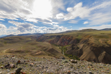 Colorful mountain in Altay. Mars valley in Kizil-Chin. Long shot. Summer time with beautiful clouds.