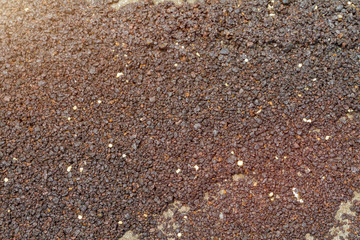 Pieces oPieces of oil refining washed up on the seashore in GOA. Close up, toned. Environmental disaster.