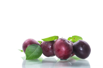 organic red ripe cherry plum isolated on white